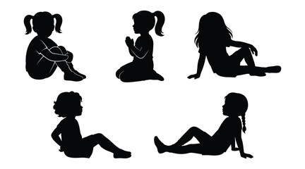 Set of silhouettes of little girls in various sitting poses