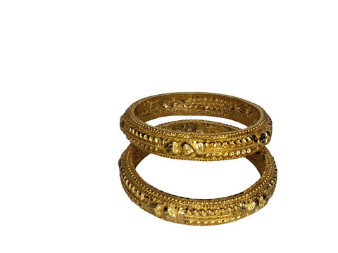 Intricate gold bangles with detailed filigree design isolated on transparent background