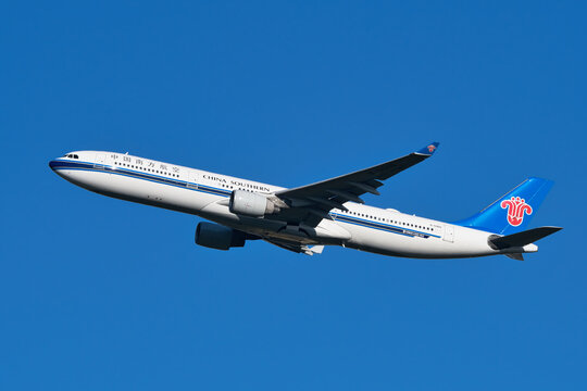 China Southern Airlines Airbus A330-300 (b-5965) passenger plane climbing after takeoff at Narita International Airport