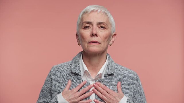 Senior Woman Experiencing Heartburn and Acid Reflux