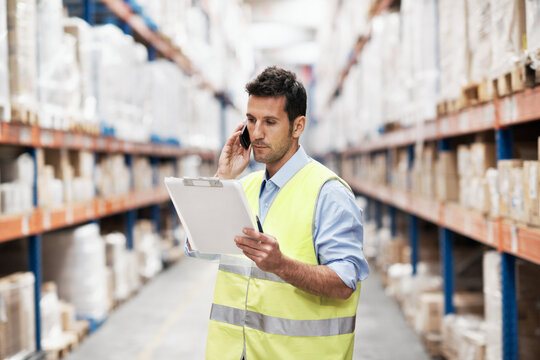 Logistics, clipboard or man with phone call in warehouse for delivery update, route enquiry or export. Shipping, dispatcher and contact supplier to confirm cargo schedule, order checklist or feedback