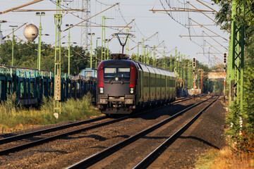 Fototapeta premium Electric locomotive on railway tracks
