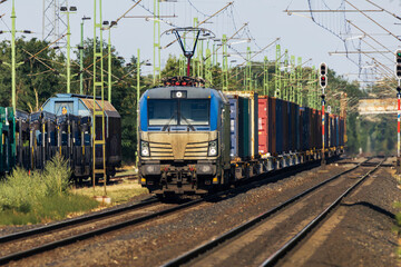 Fototapeta premium Freight train on electrified railway