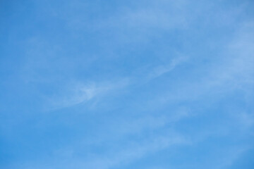 Obraz premium Beautiful blue sky with white clouds on a sunny day background