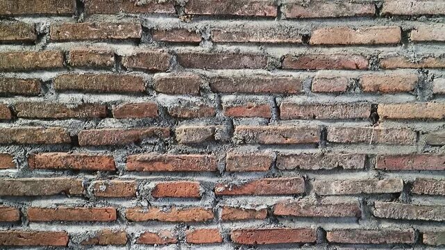 Authentic red brick wall with natural clay tones and gray mortar lines, Perfect for background texture overlays, architectural intros, urban design, motion graphics base layers, rustic or industrial 