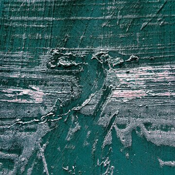 Teal and silver abstract rough textured background with distressed wall surface.