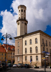 Fototapeta premium 2025-09-03; Historic town hall building with a tall white clock tower. Bystrzyca Klodzka. Poland.