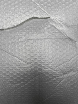 Close up of folded plastic bubble wrap packaging texture