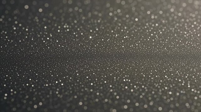 Abstract video of shimmering gold and silver glitter sparkles and bokeh lights background loop