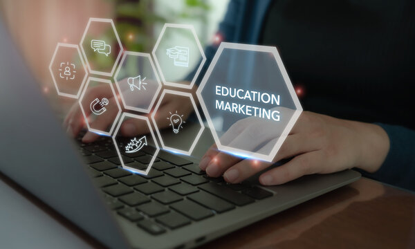 Education marketing strategy concept. A person works on a laptop with digital education marketing icons. Content strategy, online learning, audience engagement, lead generation and brand growth.