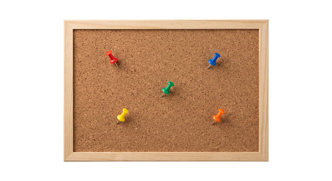 Cork bulletin board with colorful push pins scattered across the surface