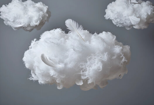 Fluffy white clouds made of cotton and feathers floating against a soft gray background, lightness and dreams