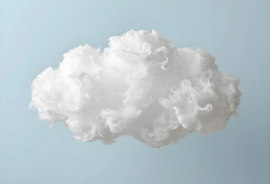 Fluffy white cloud shape made of soft cotton or synthetic fiber on a light blue background lightness and comfort, this abstract representation feelings of lightness comfort and purity