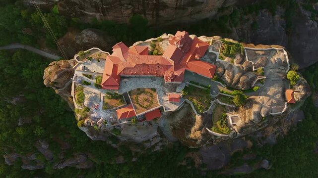 Aerial view of the Monastery of the Holy Trinity at Sunrise, Meteora, Greece