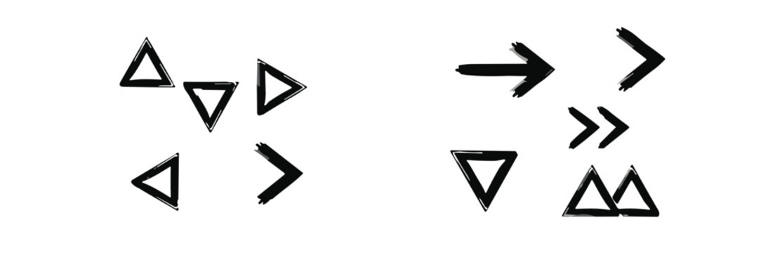 Collection of hand-drawn black ink triangle and arrow symbols isolated on white background, arrows triangles