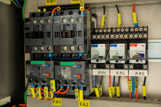 Industrial contactors and thermal overload relays in an electrical control panel
