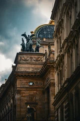 Fotobehang Tsjechië Statue of a quadriga and neoclassical architecture in Prague, Czech Republic  © aascrll