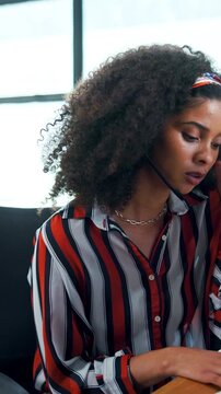 Telemarketing, woman and stress in office with computer, outbound call rejection and fatigue from job. Coworking, person and tired consultant in business with pc, lead generation problem and burnout.
