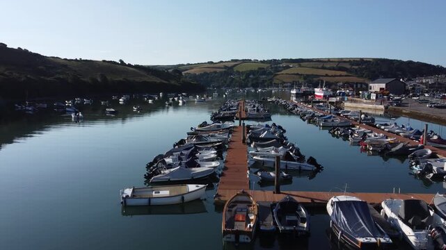 Aerial drone view of pontoons and moorings in Batson Creek, Salcombe, South Devon, England