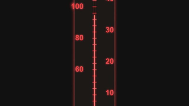 Close up view of a digital thermometer display showing rising temperature levels.