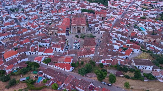 Aerial drone view of the Parish Church of Our Lady of the Assumption and the town of Aracena in the Sierra de Aracena and Picos de Aroche Natural Park, Sierra Morena, Province of Huelva, Andalusia, Sp
