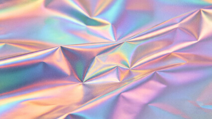 Fototapeta premium Abstract grainy background with iridescent rainbow holographic foil crinkles texture and metallic plastic wrap wrinkles for futuristic creative design backdrops.
