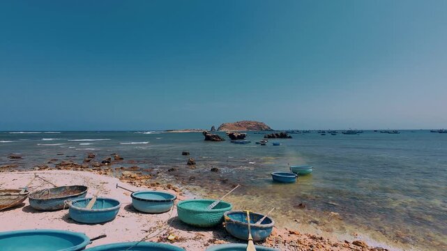 Vietnamese Coracle Boats on Fossilized Coral Beach in Vietnam