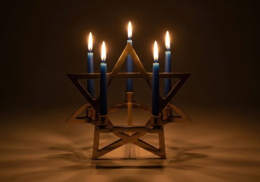 A starshaped candle holder with five lit blue candles