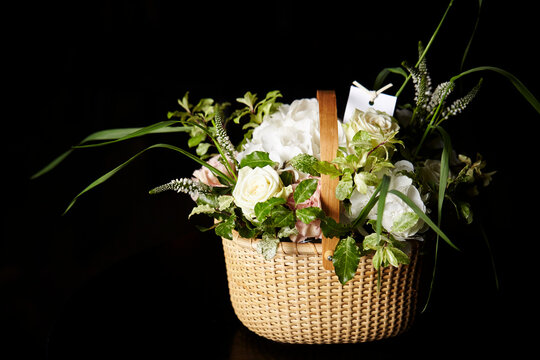 Flower arrangement on the table, flower basket