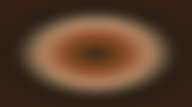 A seamless looping radial gradient animation creates a hypnotic warm brown and tan blur.