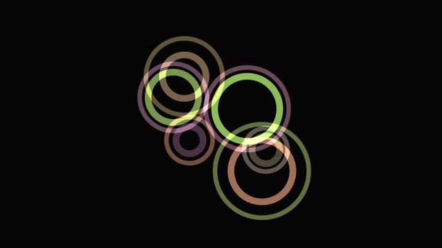 Colorful overlapping circles display various hues and gradients against a dark background