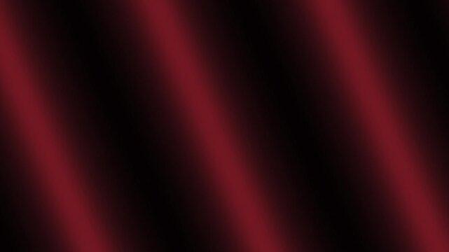 Glowing crimson light beams intersect diagonally against a deep black background to create an abstract atmosphere.