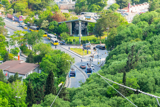 Aerial view of Ey&uuml;p Pierre Loti cable car line with city traffic and green trees in İstanbul, Turkey