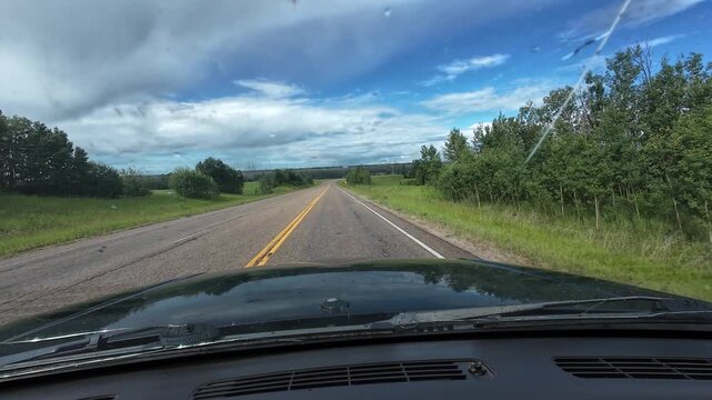 Driving on Highway Through Cracked Windshield in Summer