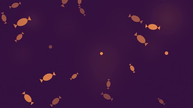 Halloween background of falling wrapped candies, seamless loop in purple and orange twilight