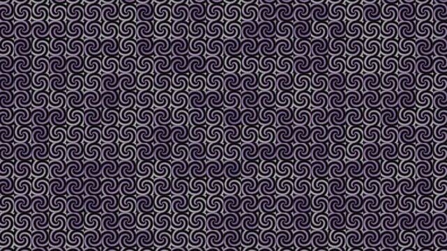 A repeating geometric pattern of interlocking spirals fills the frame with intricate symmetry and a cool color palette.