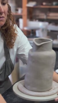 Close-up of a Person Shaping Clay Pot
