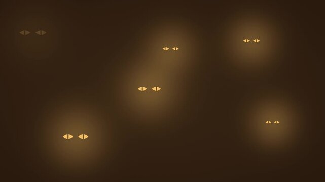 Halloween background of glowing eyes blinking in the dark, seamless loop in golden amber
