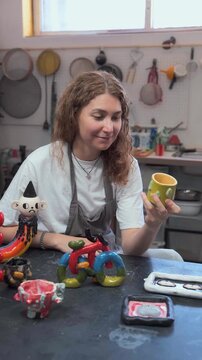 Ceramist at Work with Colorful Handcrafted Ceramics