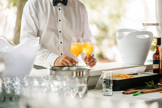 Outdoor bar counter. Aperol in a glass.