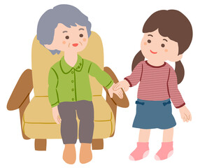 ソファーに座っている祖母と横に立つ女の子