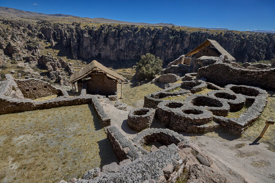 T'aqrachullo rises like a forgotten city carved into stone. Spread across seventeen hectares of windswept mesa in Espinar, Cusco, this ancient citadel holds nearly six hundred structures 