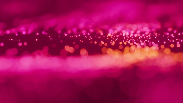 Dynamic warm glowing bokeh lights abstract background with soft motion blur with video smooth horizontal pan