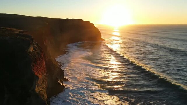 Ocean Sunset Cliffside: A dramatic cliffside overlooks the vast ocean as the sun dips below the horizon, casting a golden glow on the waves and sky.