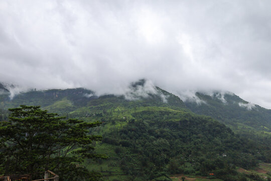 Misty Clouds Rolling Over Green Mountain Peaks in Ramboda, Sri Lanka