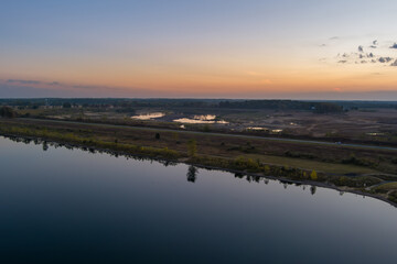 Fototapeta premium Aerial view tranquil Crandell lake reflecting twilight sky