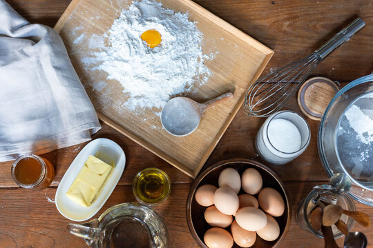 Baking essentials on wooden table.