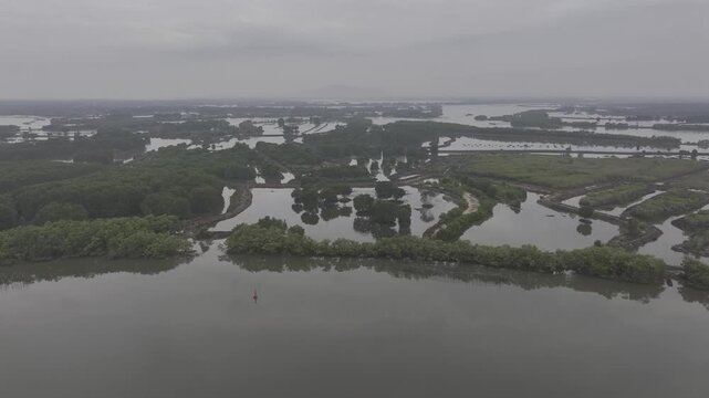Aerial drone view of oyster farming rafts on the river in Long Son, near Ho Chi Minh City, Vietnam.