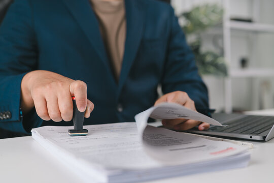 Business contract document stamping with approval seal, agreement verification, official paperwork process, legal compliance and corporate documentation concept.
