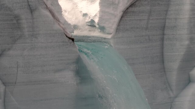 Glacier Ice Melt Dripping from a Massive Arctic Iceberg